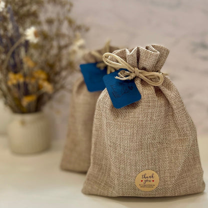 A Gift Bag with Soap and Soap Dish.